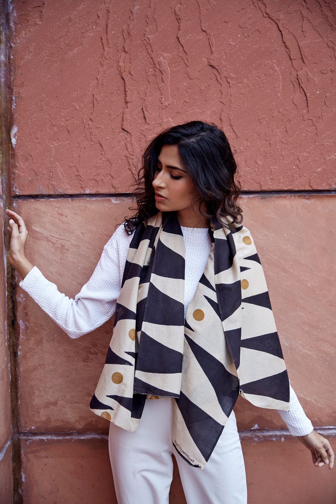 Hand block printed cotton silk scarf with a bold geometric print in black and ochre. Hand block printed with natural dyes on cotton silk. 